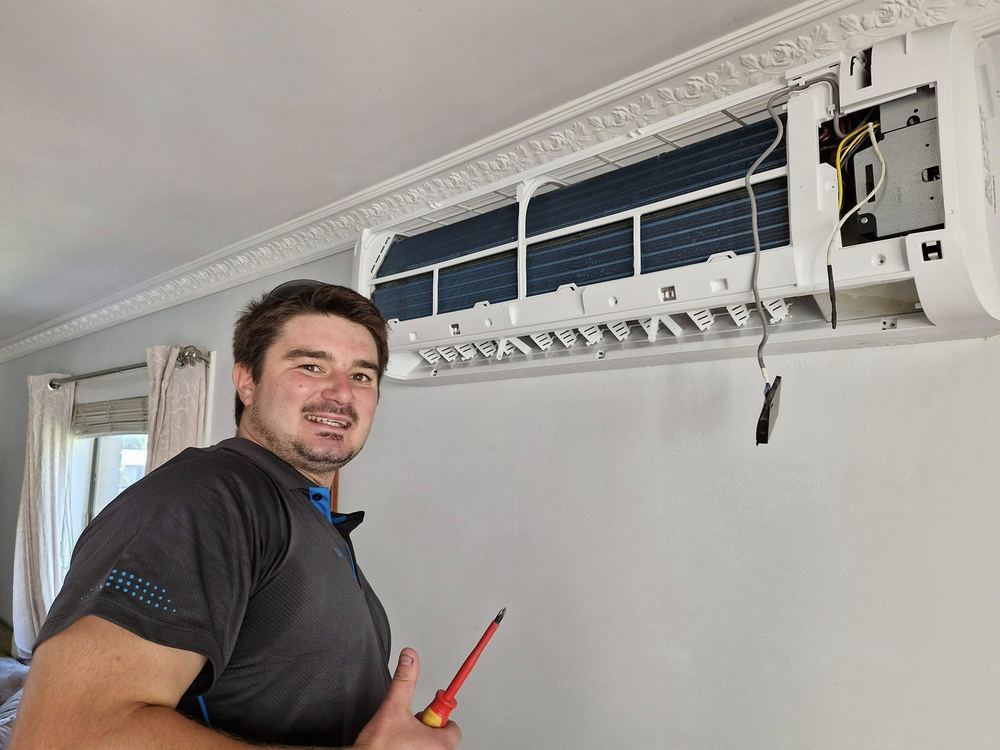 Dan from 1st Class Air Conditioning & Maintenance finishing a split system install